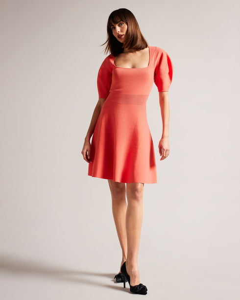 HAYLIY-Dresses-Feminine, flattering and a wardrobe staple, HAYLIY is ideal for day-to-night dressing. Cut with short puff sleeves, a square neckline and a zip fastening, this dress will be your go-to piece for bar-hopping and date nights.This product is made using FSC ® Viscose fibres. The fabric of this product is partly made of a more sustainable viscose fibre, which comes from responsibly managed forests. Skater dress Short puff sleeves Square neck Zip fastening Elasticated waistband Julia is 5'10" / 1.7